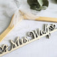 Personalized natural wood bridal hanger with tulle bow and heart accents, custom name wedding hanger handmade in U.S.A