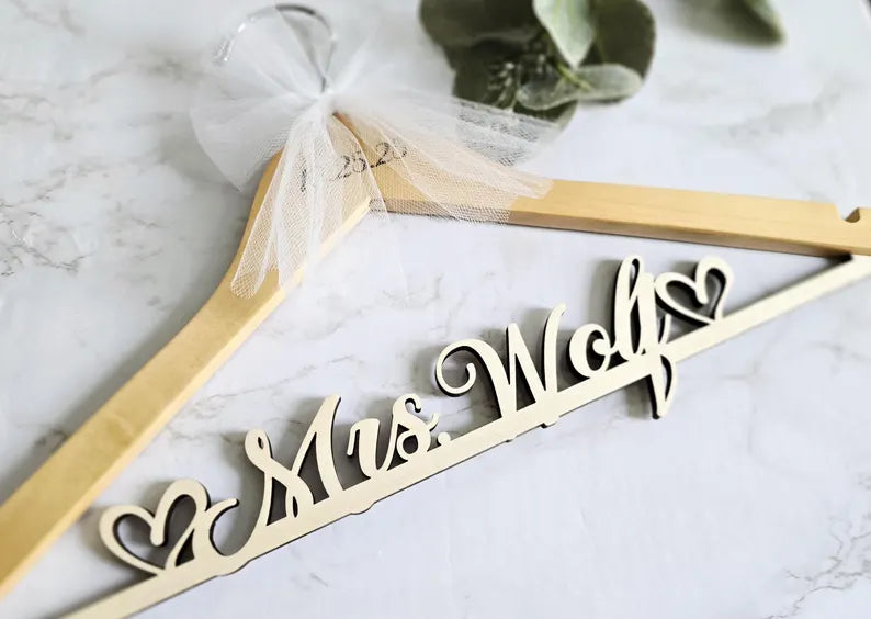 Personalized natural wood bridal hanger with tulle bow and heart accents, custom name wedding hanger handmade in U.S.A